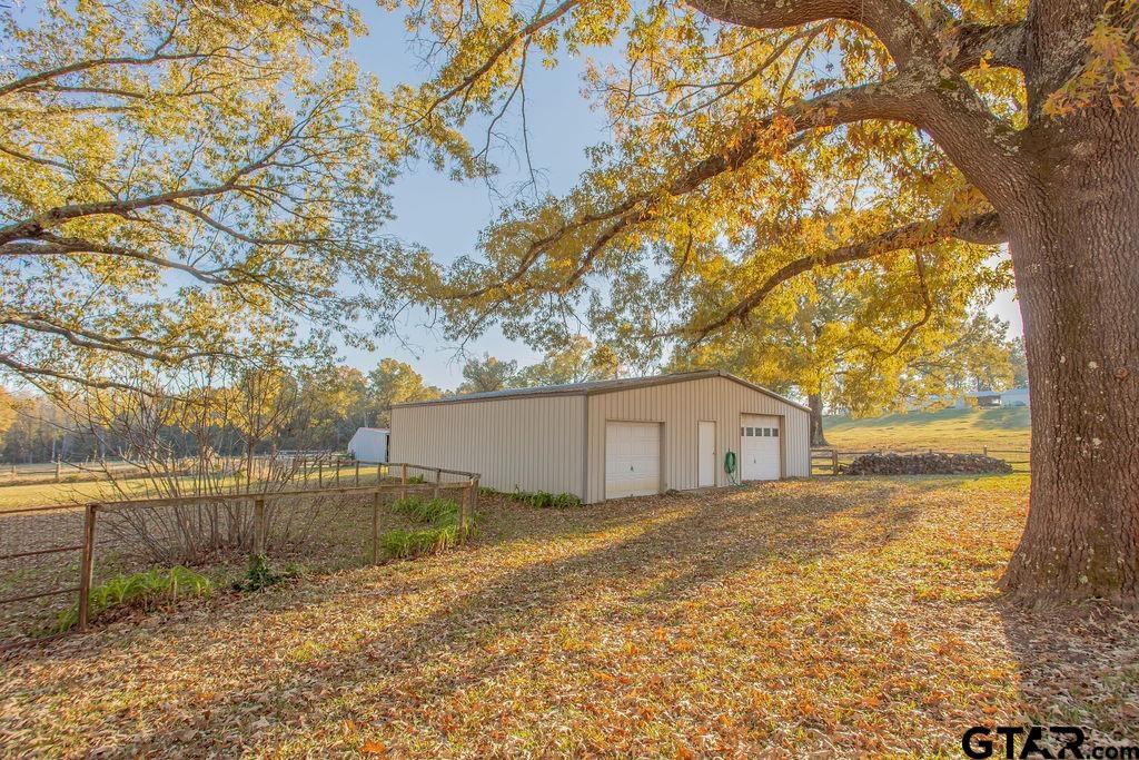 12575 FM 3271 Tyler, TX 75704 - Photo 11 of 47 a view of a backyard of the house
