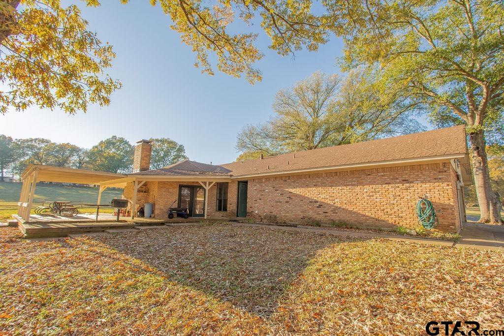 12575 FM 3271 Tyler, TX 75704 - Photo 2 of 47 a view of a white house with a snow on the road