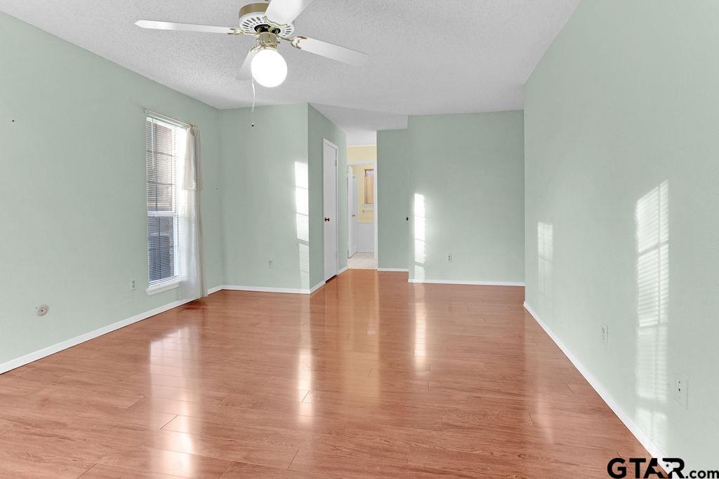 12575 FM 3271 Tyler, TX 75704 - Photo 28 of 47 a view of livingroom with hardwood floor and ceiling fan