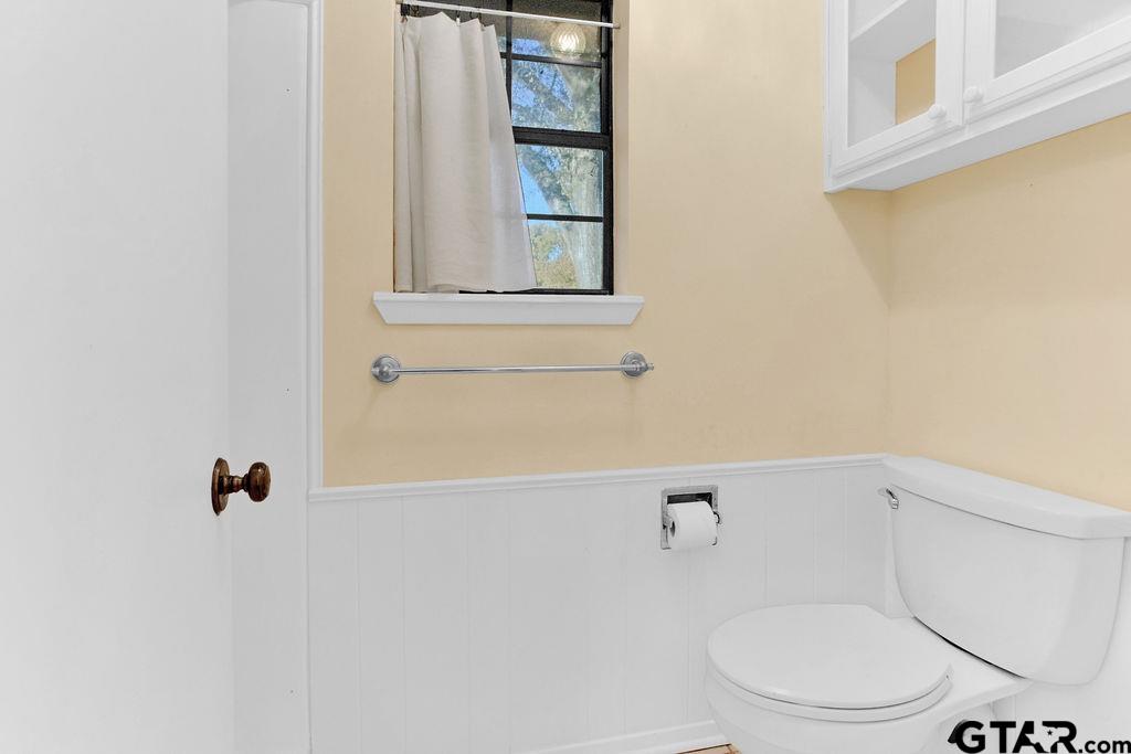 12575 FM 3271 Tyler, TX 75704 - Photo 30 of 47 a white toilet sitting next to a shower