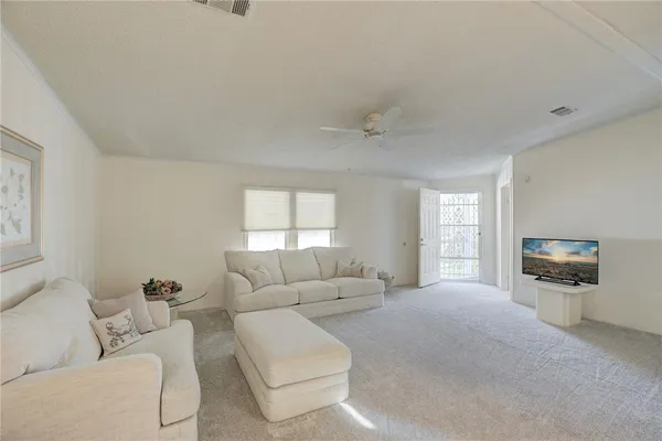 a living room with furniture and a couch
