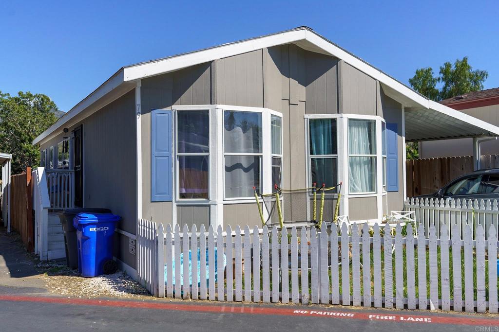 a front view of a house with a porch