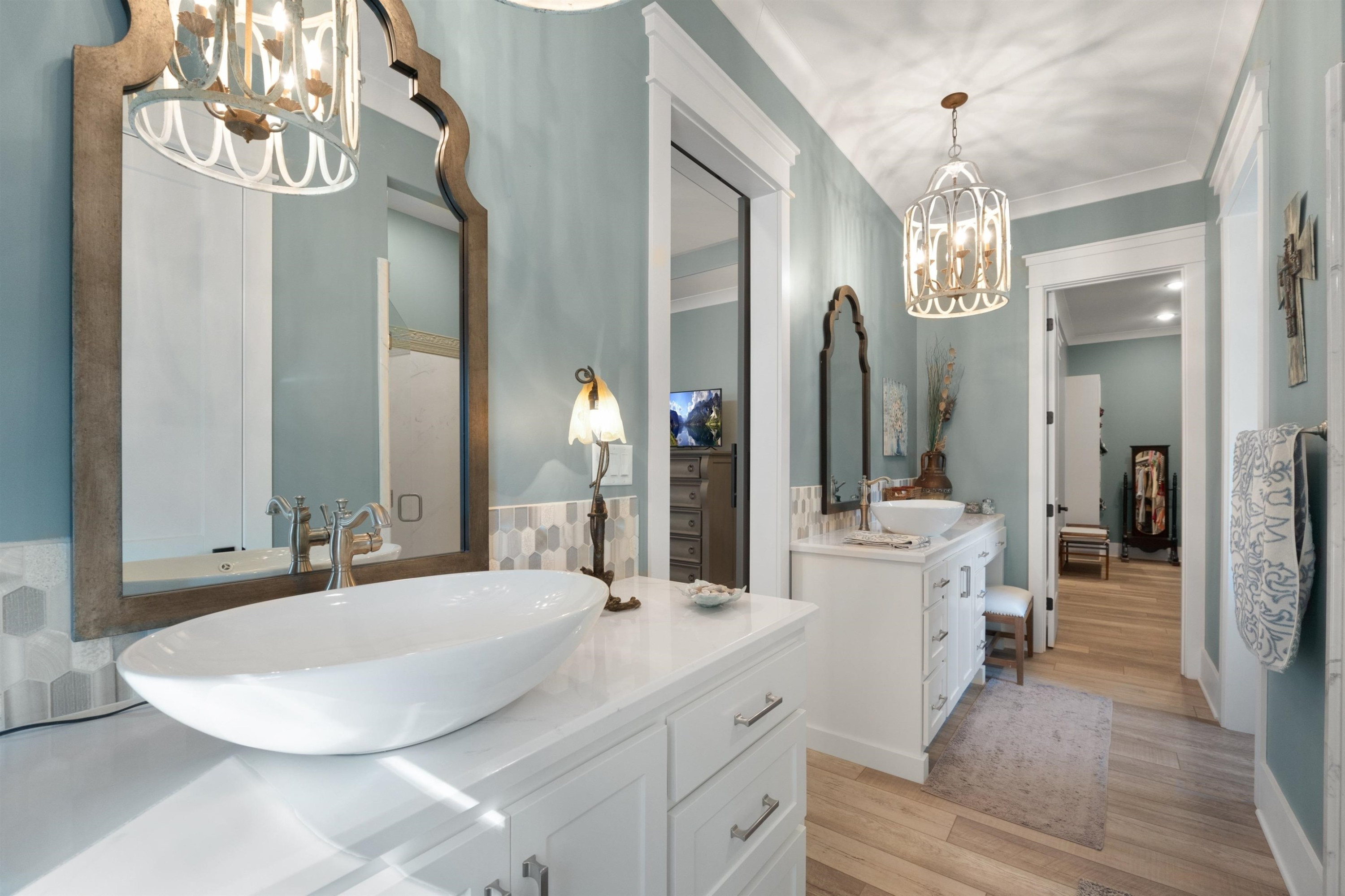 491 Cooper Anderson Road Jackson, TN 38305 - Photo 17 of 30 a bathroom with a double vanity sink and a mirror