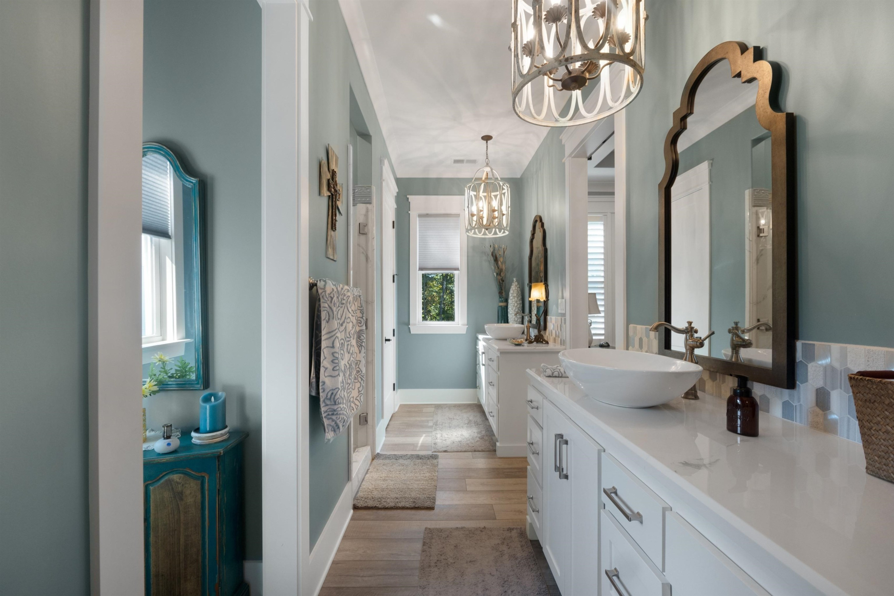 491 Cooper Anderson Road Jackson, TN 38305 - Photo 19 of 30 a bathroom with a double vanity sink and a mirror