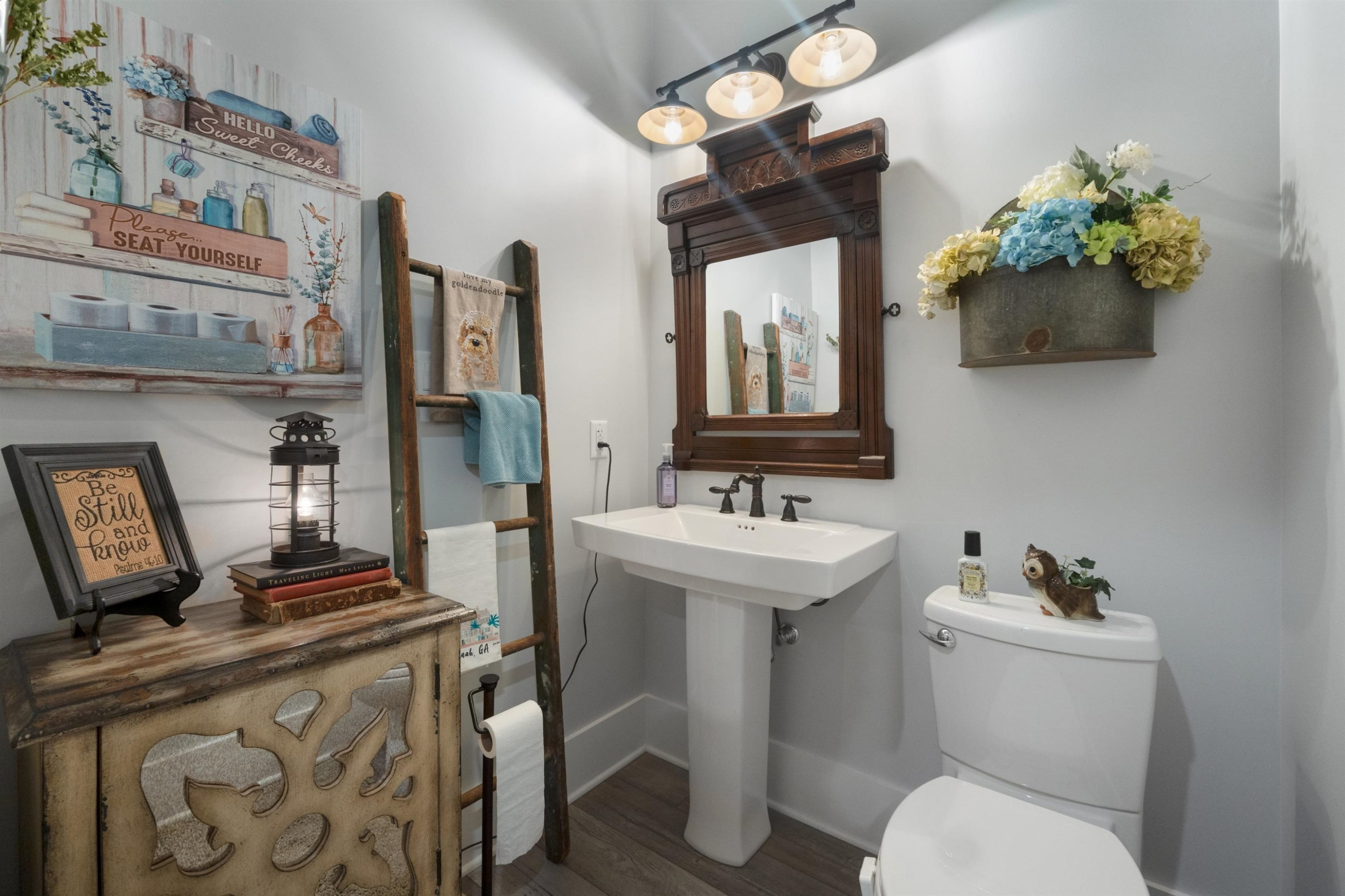 491 Cooper Anderson Road Jackson, TN 38305 - Photo 26 of 30 a bathroom with a toilet sink and mirror
