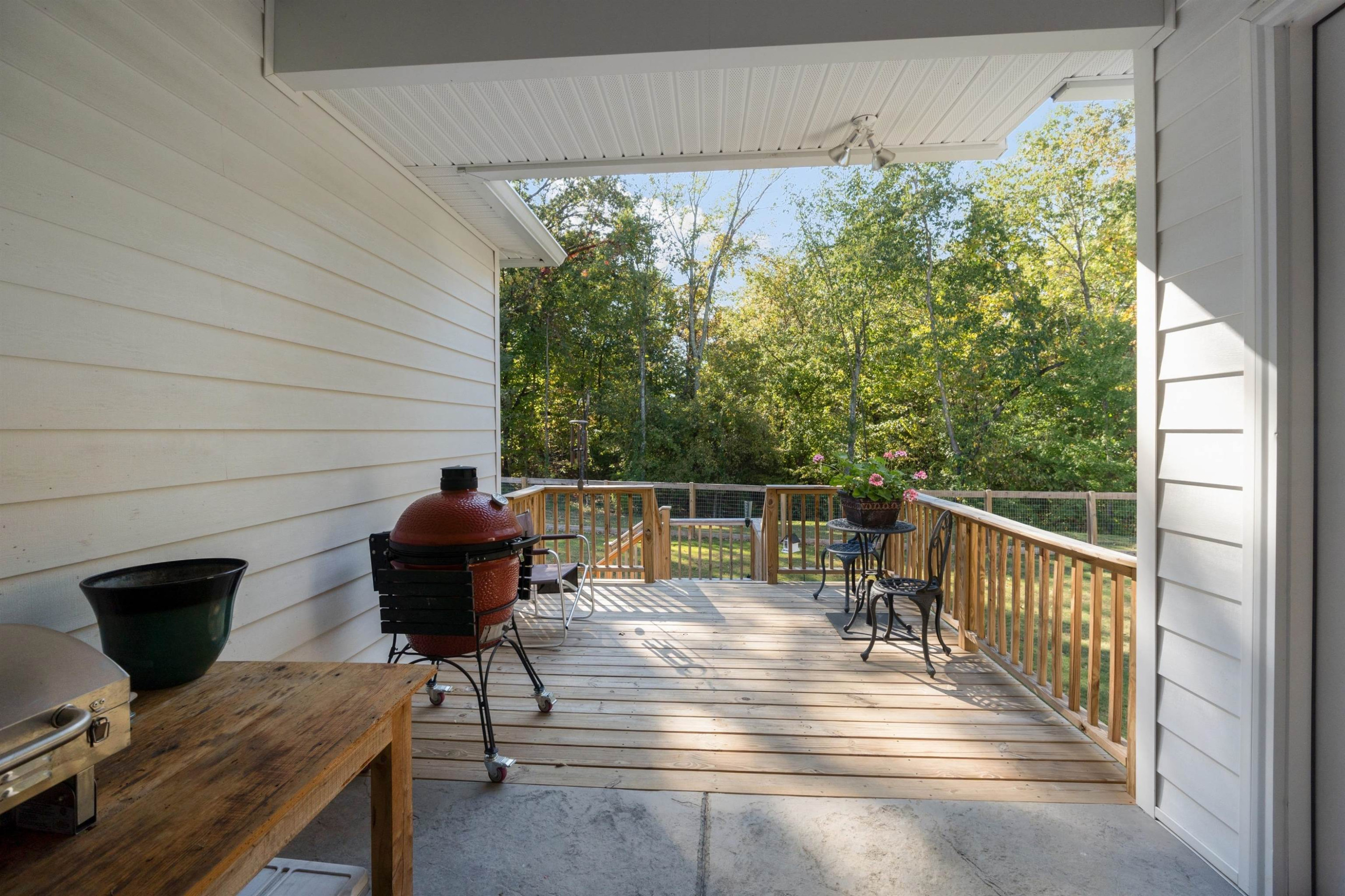 491 Cooper Anderson Road Jackson, TN 38305 - Photo 28 of 30 a view of a chairs and table on the deck