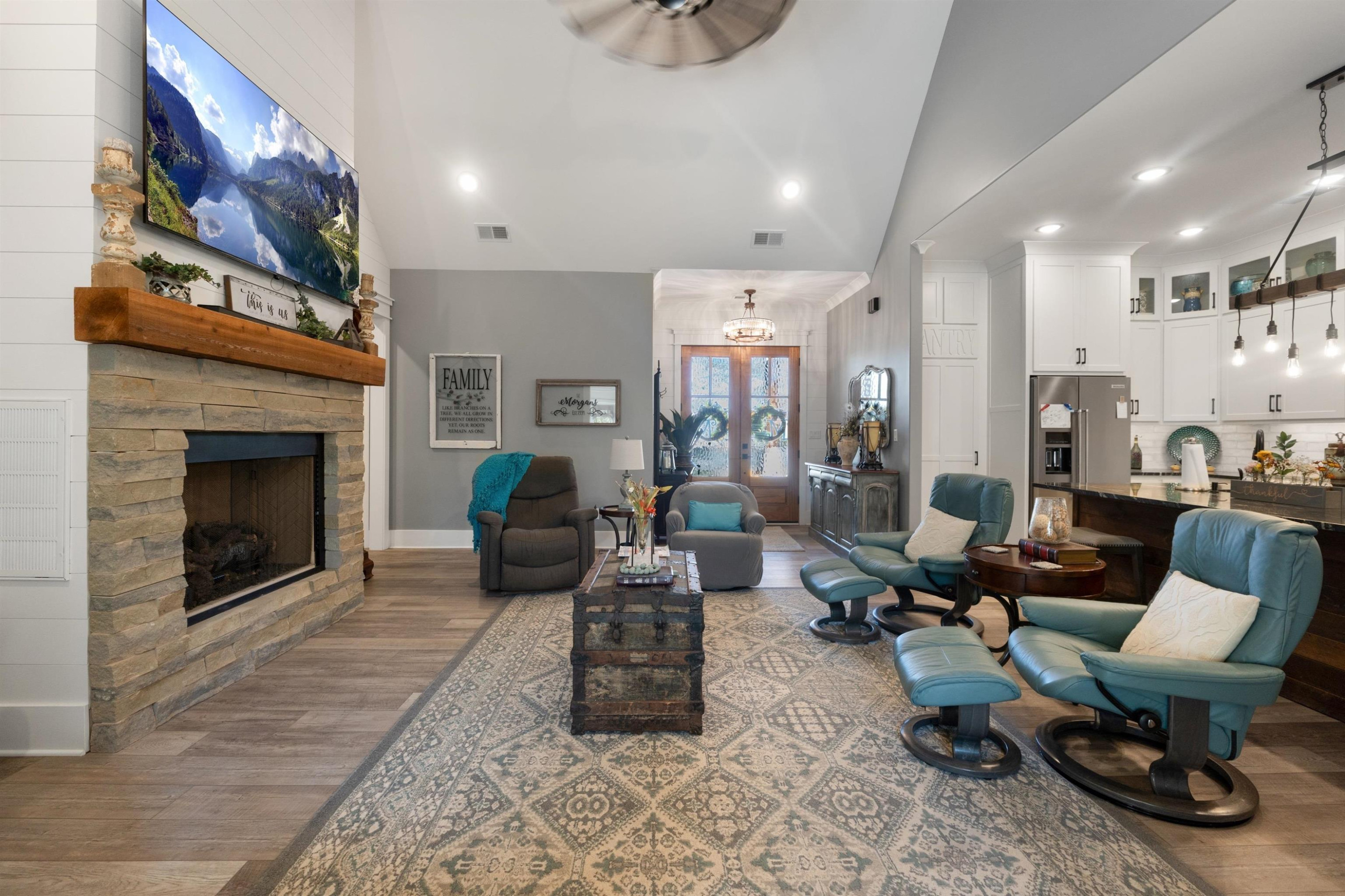 491 Cooper Anderson Road Jackson, TN 38305 - Photo 4 of 30 a living room with furniture and a fireplace