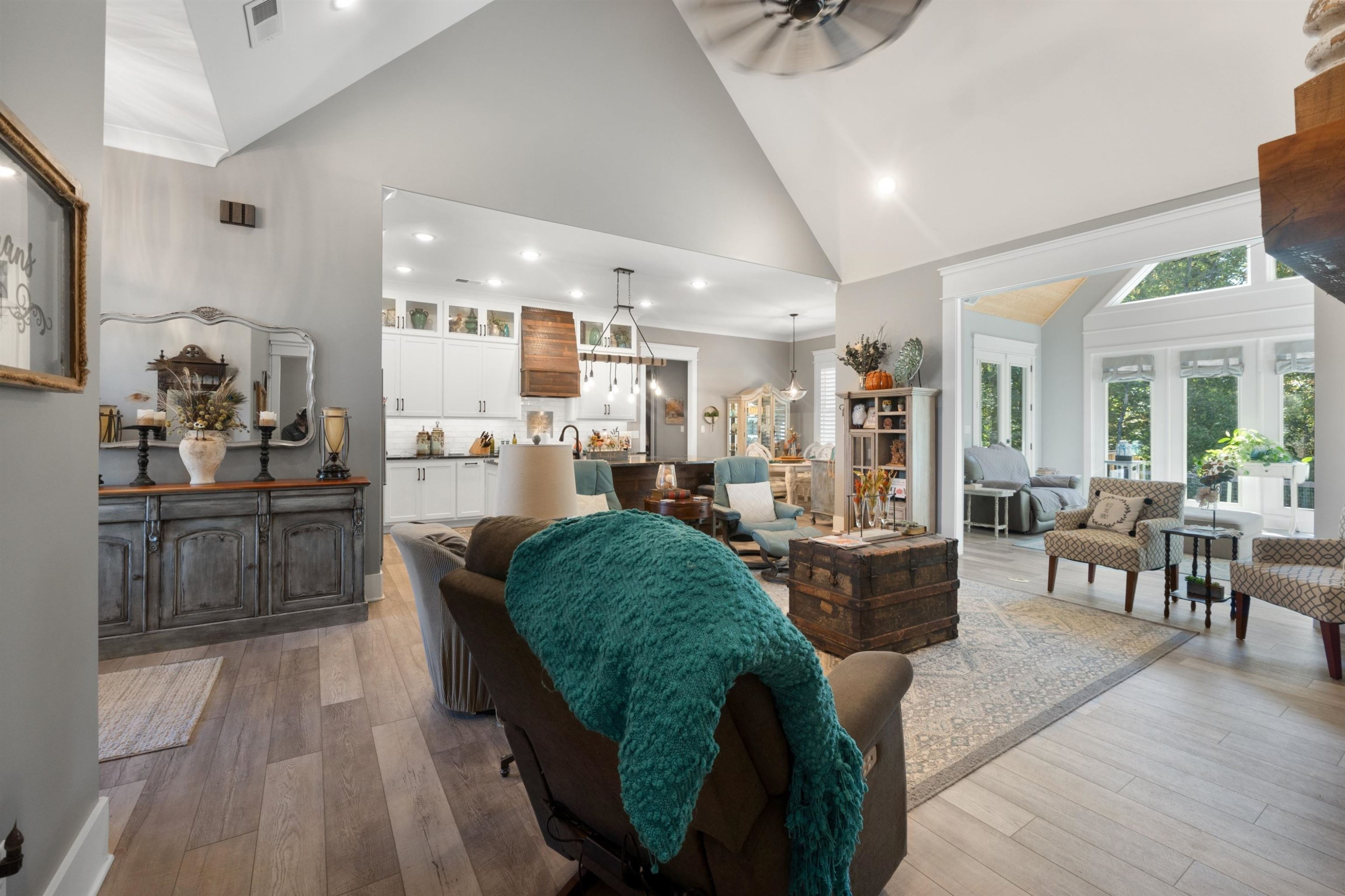 491 Cooper Anderson Road Jackson, TN 38305 - Photo 6 of 30 a living room with stainless steel appliances furniture a rug kitchen view and a large mirror