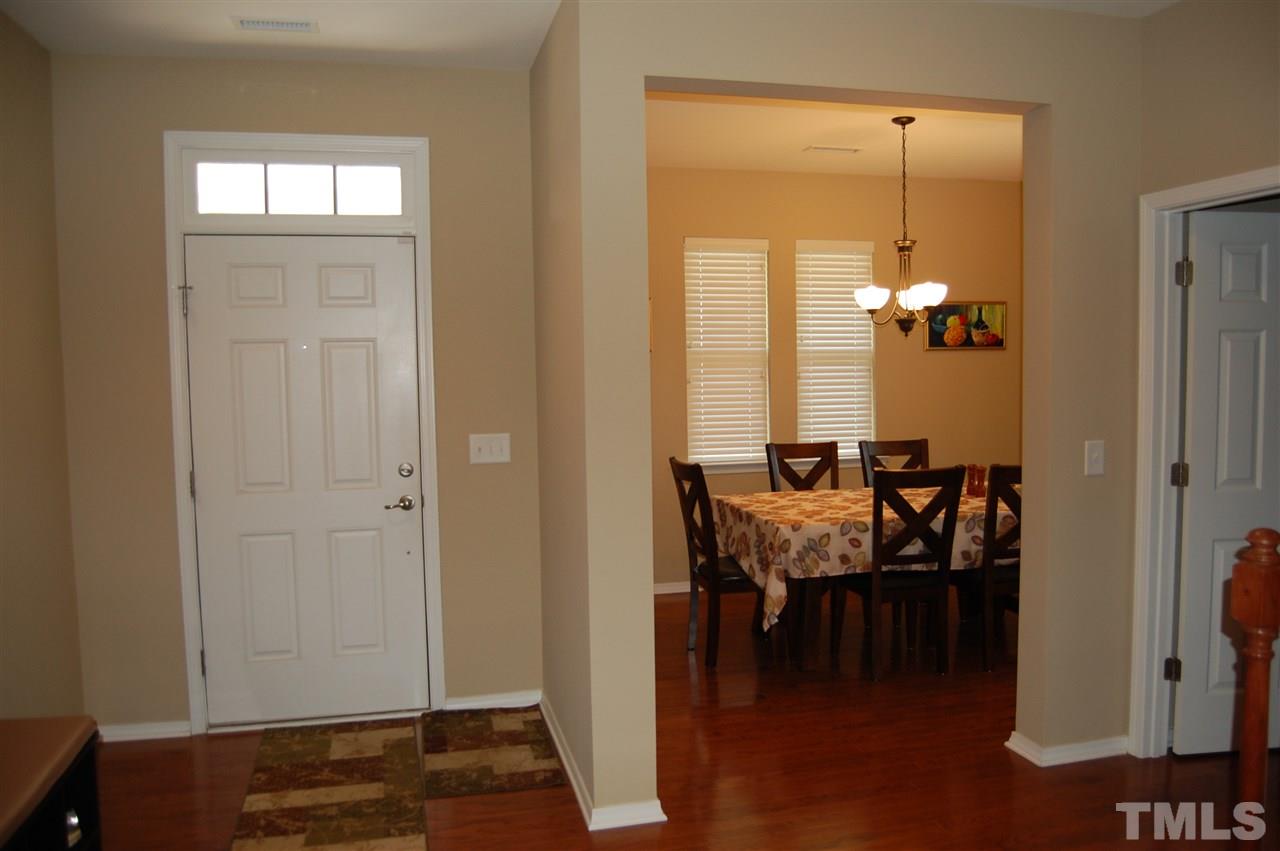 313 Riversville Court Cary, NC 27519 - Photo 11 of 25 Large foyer with hardwoods through out.