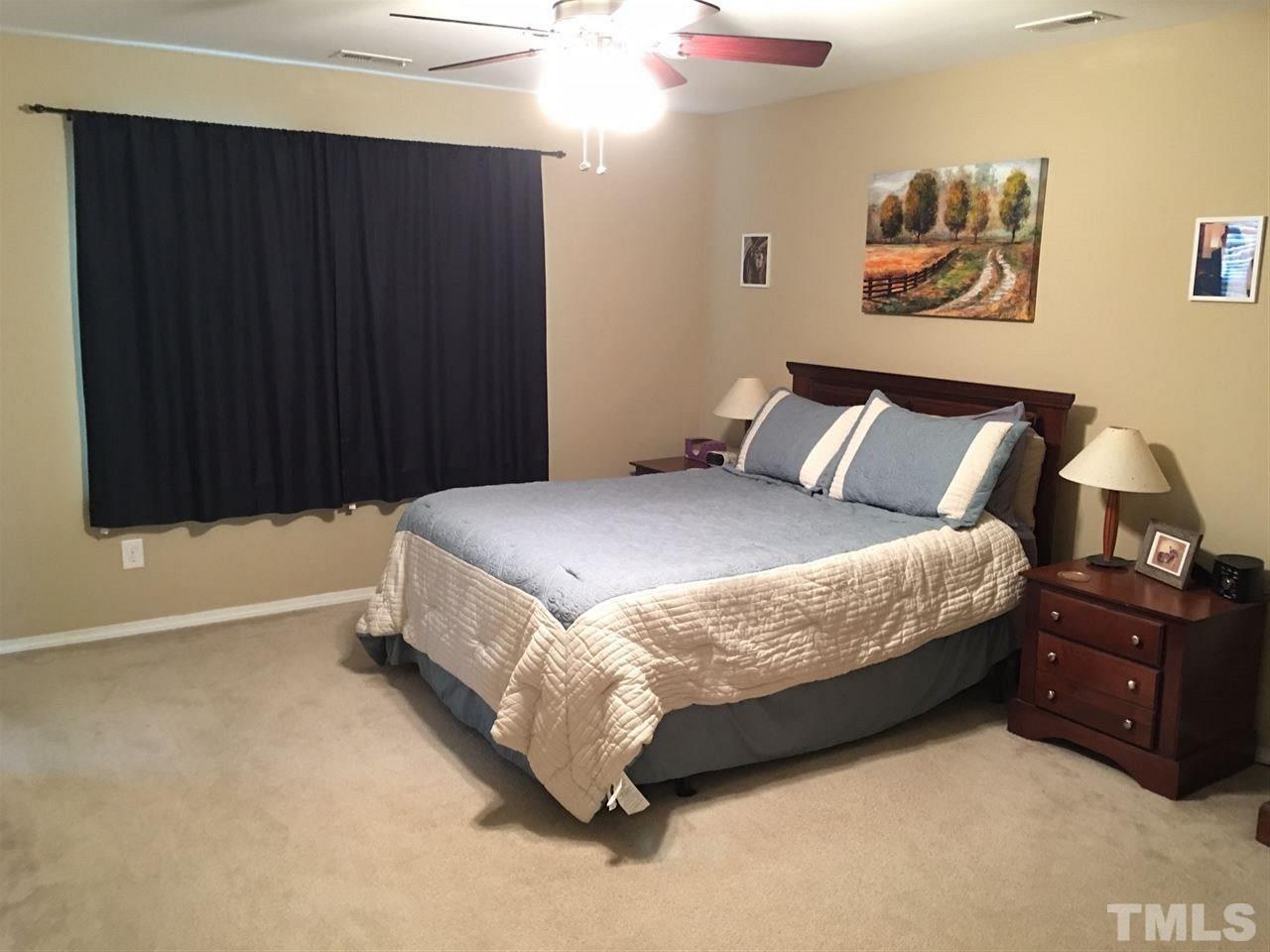 313 Riversville Court Cary, NC 27519 - Photo 13 of 25 Wide room that can easily fit a King sized bed and dressers.