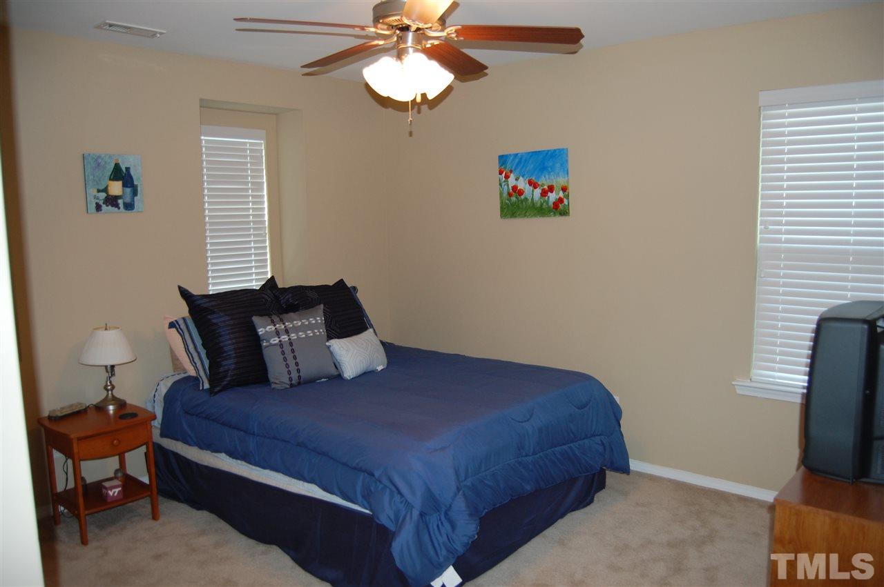 313 Riversville Court Cary, NC 27519 - Photo 18 of 25 Fourth bedroom is also large.