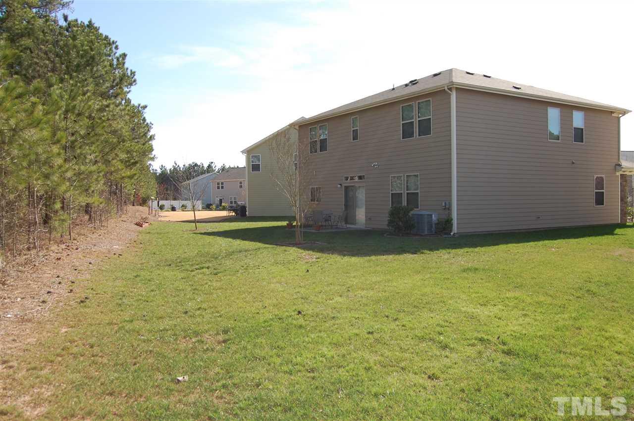 313 Riversville Court Cary, NC 27519 - Photo 3 of 25 Pie shaped lot with large width in the back.