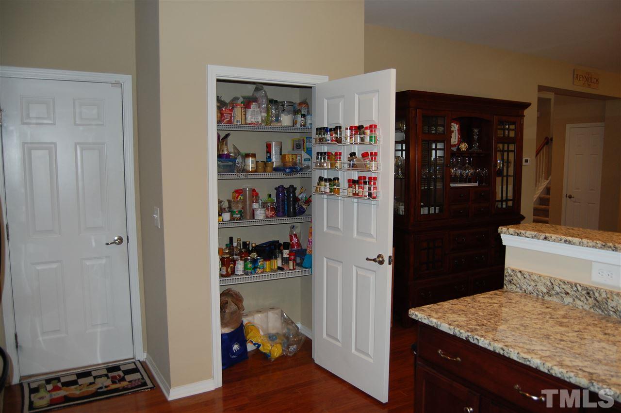 313 Riversville Court Cary, NC 27519 - Photo 5 of 25 Roomy pantry provides great storage in the kitchen.