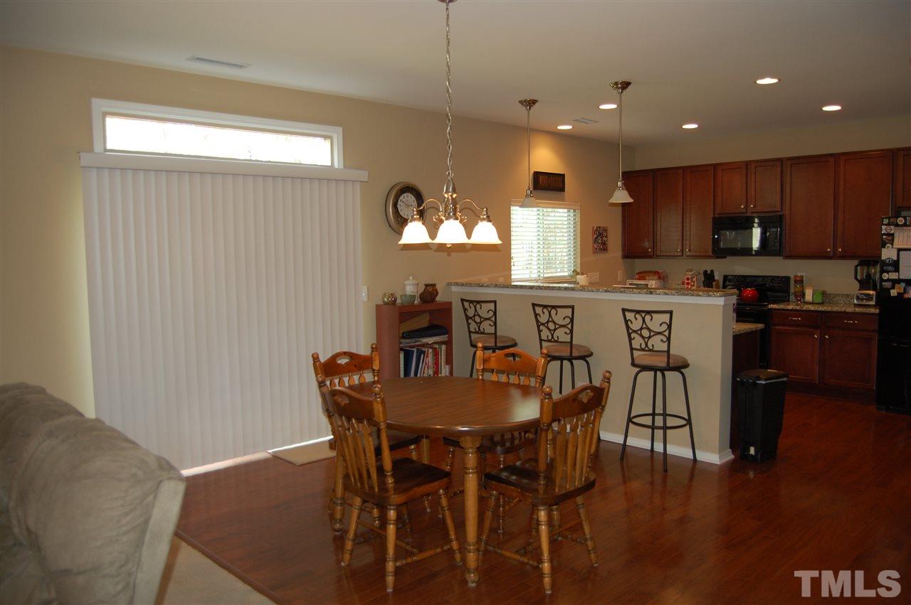 313 Riversville Court Cary, NC 27519 - Photo 6 of 25 Large breakfast area can easily fit a large dining room table.