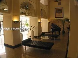 a kitchen with lots of counter top space and wooden floor