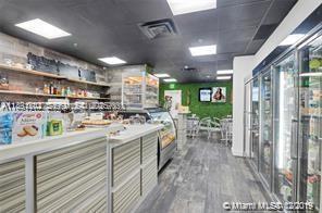 780 Northeast 69th Street, Unit 1406 Miami, FL 33138 - Photo 10 of 22 a kitchen with lots of counter top space
