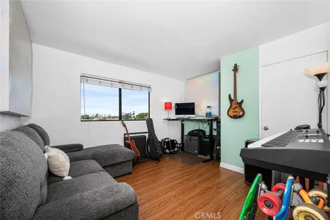 a living room with a couch and a window