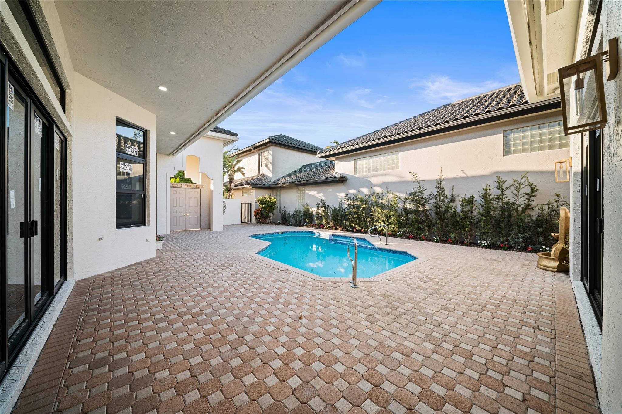 22722 El Dorado Drive Boca Raton, FL 33433 - Photo 16 of 50 a view of a pool with an outdoor space