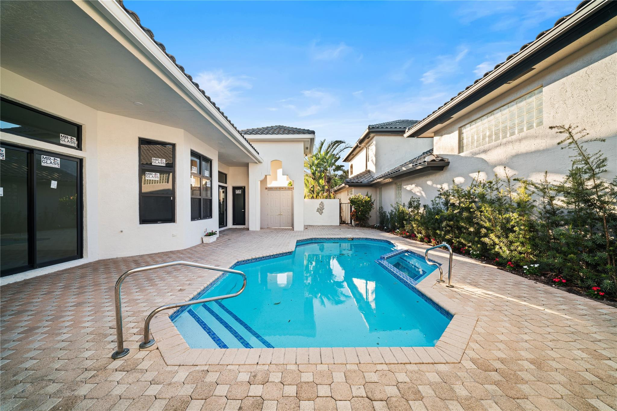 22722 El Dorado Drive Boca Raton, FL 33433 - Photo 18 of 50 a front view of a house with garden