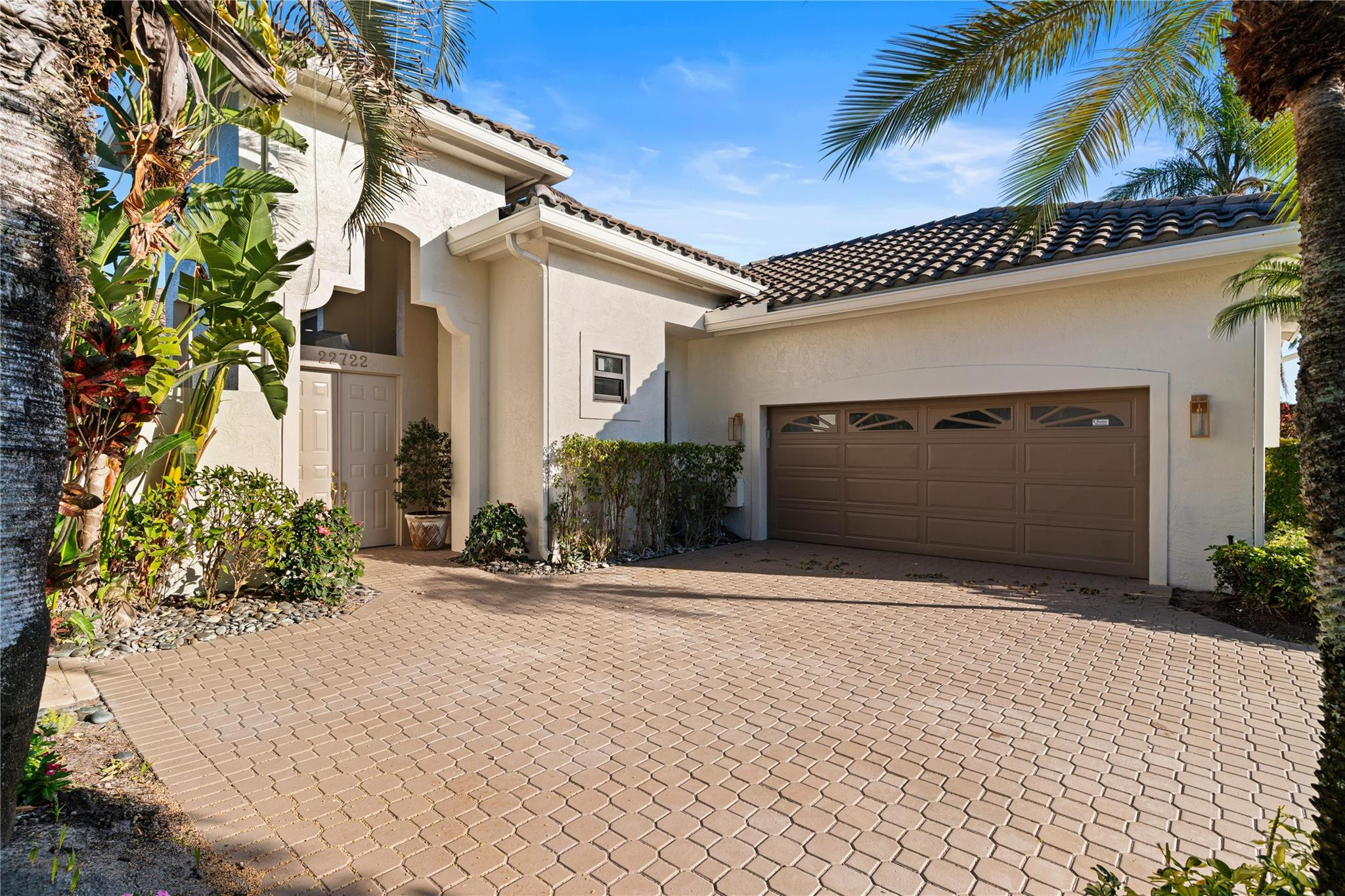 22722 El Dorado Drive Boca Raton, FL 33433 - Photo 25 of 50 a front view of a house