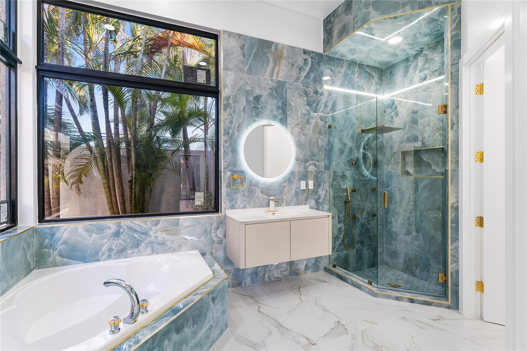 22722 El Dorado Drive Boca Raton, FL 33433 - Photo 30 of 50 a bathroom with a sink and a mirror