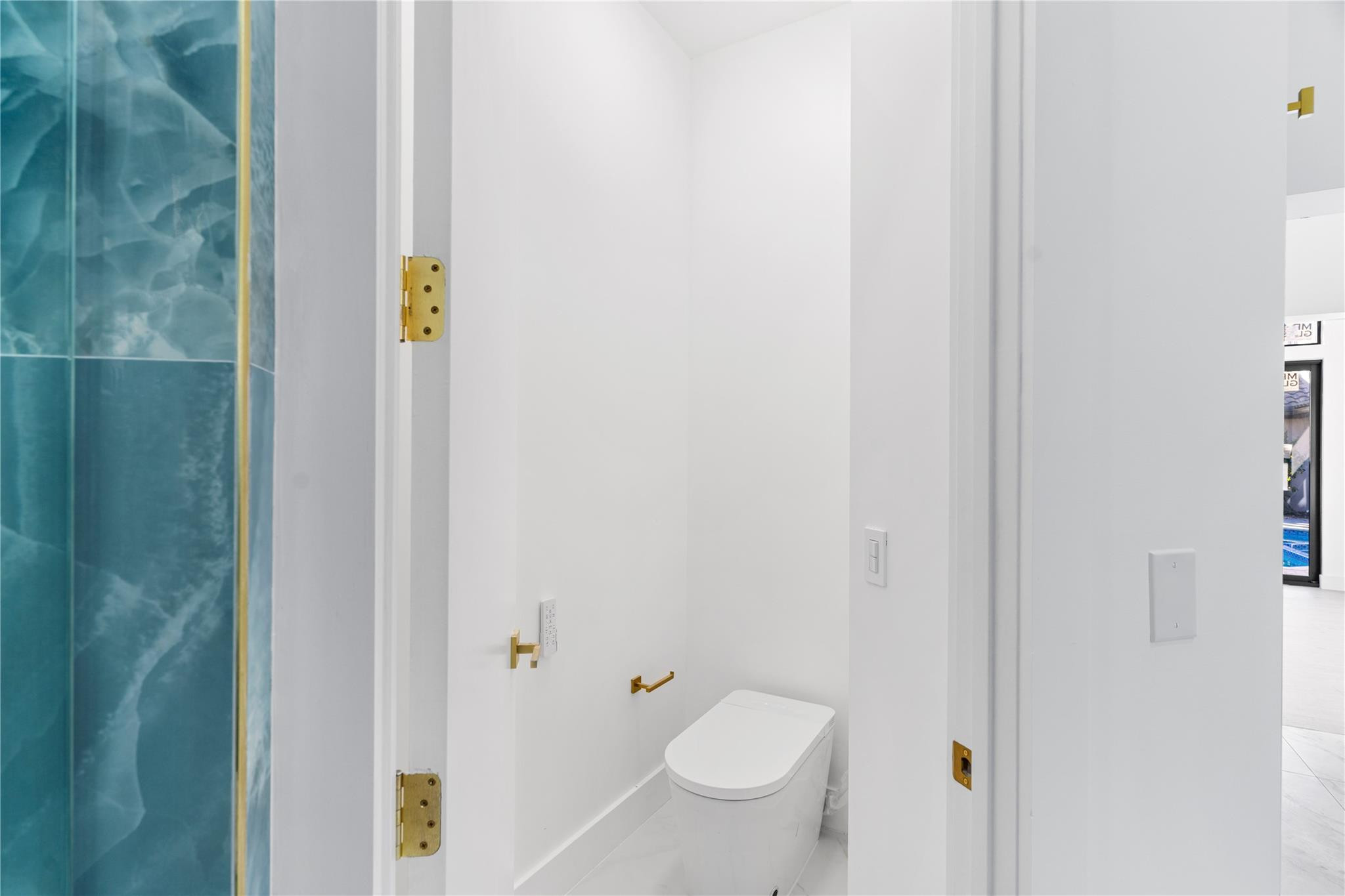 22722 El Dorado Drive Boca Raton, FL 33433 - Photo 31 of 50 a bathroom with a toilet and a shower