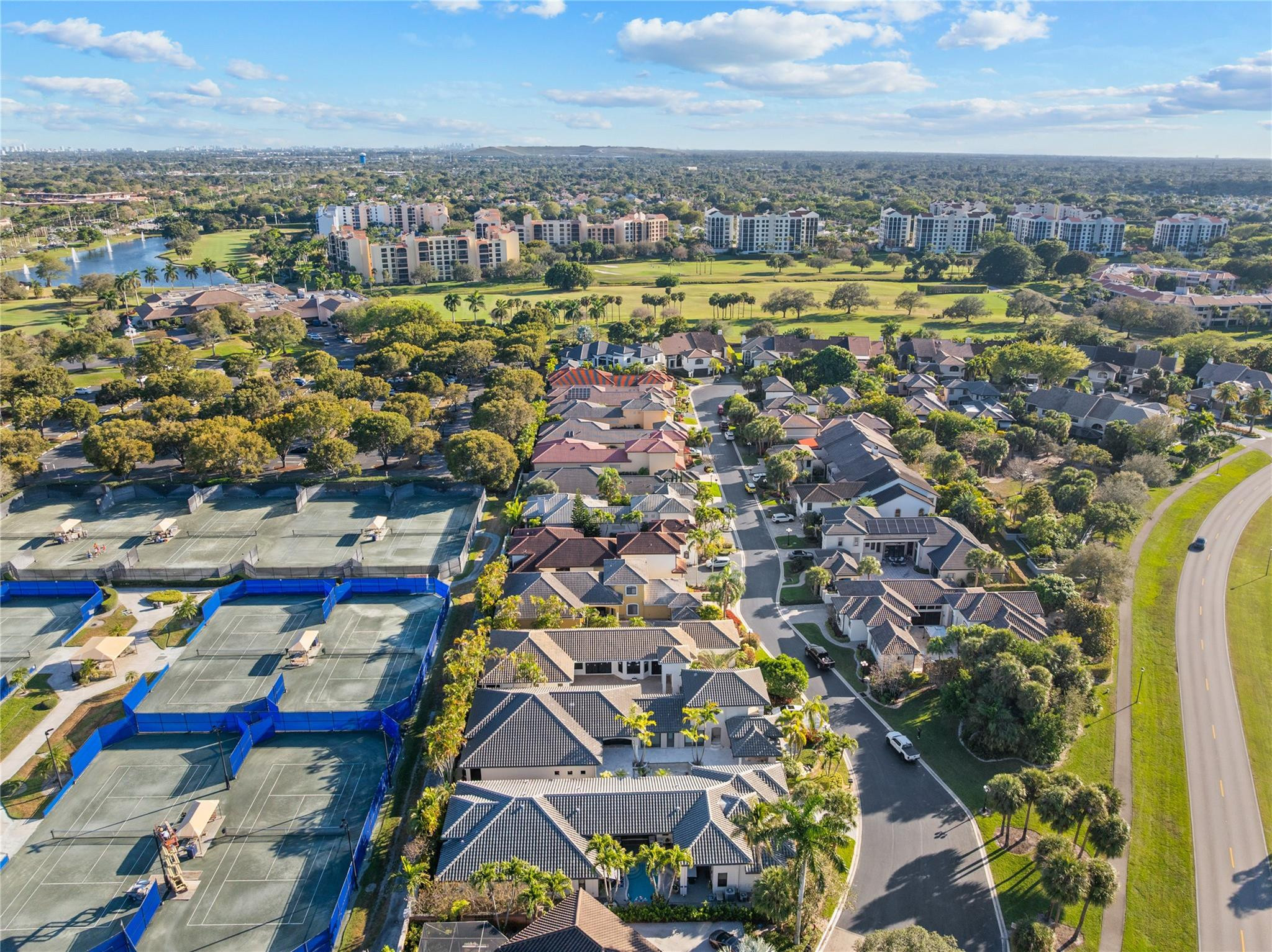 22722 El Dorado Drive Boca Raton, FL 33433 - Photo 44 of 50 an aerial view of a city with lots of residential buildings