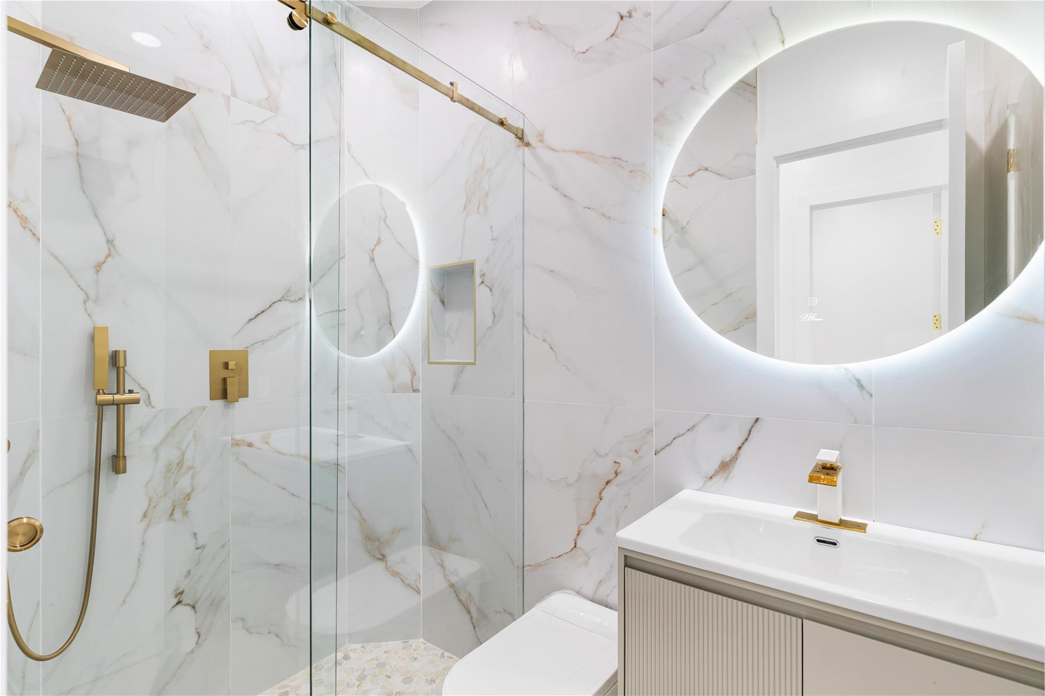 22722 El Dorado Drive Boca Raton, FL 33433 - Photo 9 of 50 a bathroom with a sink a toilet and shower