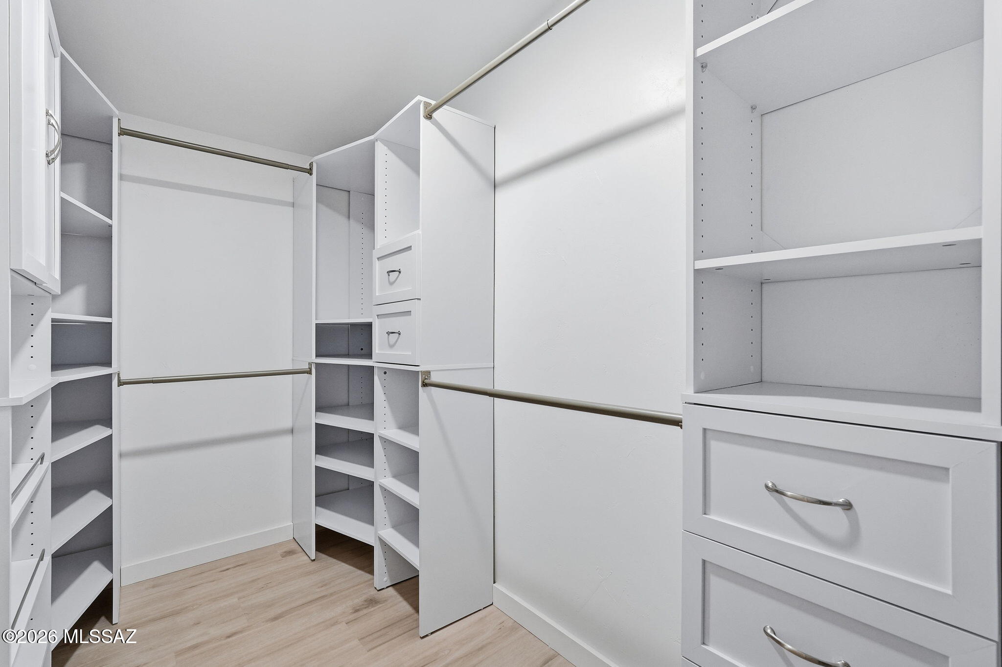 950 West Ina Road Tucson, AZ 85704 - Photo 21 of 54 a view of an empty walk in closet