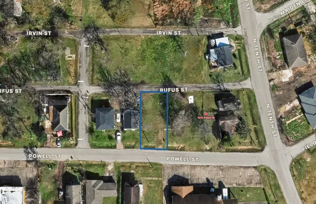 a view of outdoor space with deck and yard