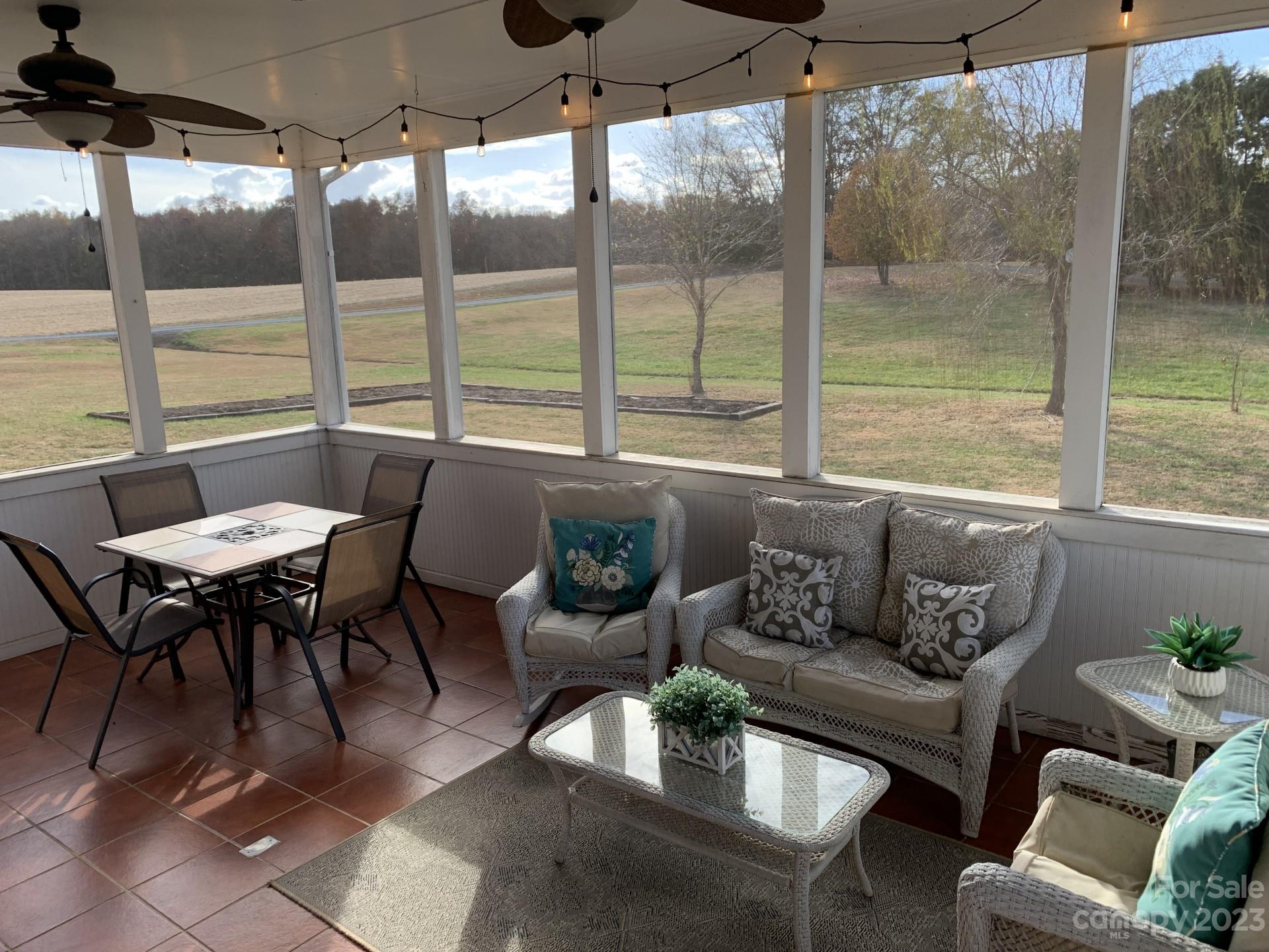 1026 Snyders Store Road Wingate, NC 28174 - Photo 21 of 34 a living room with furniture and a window