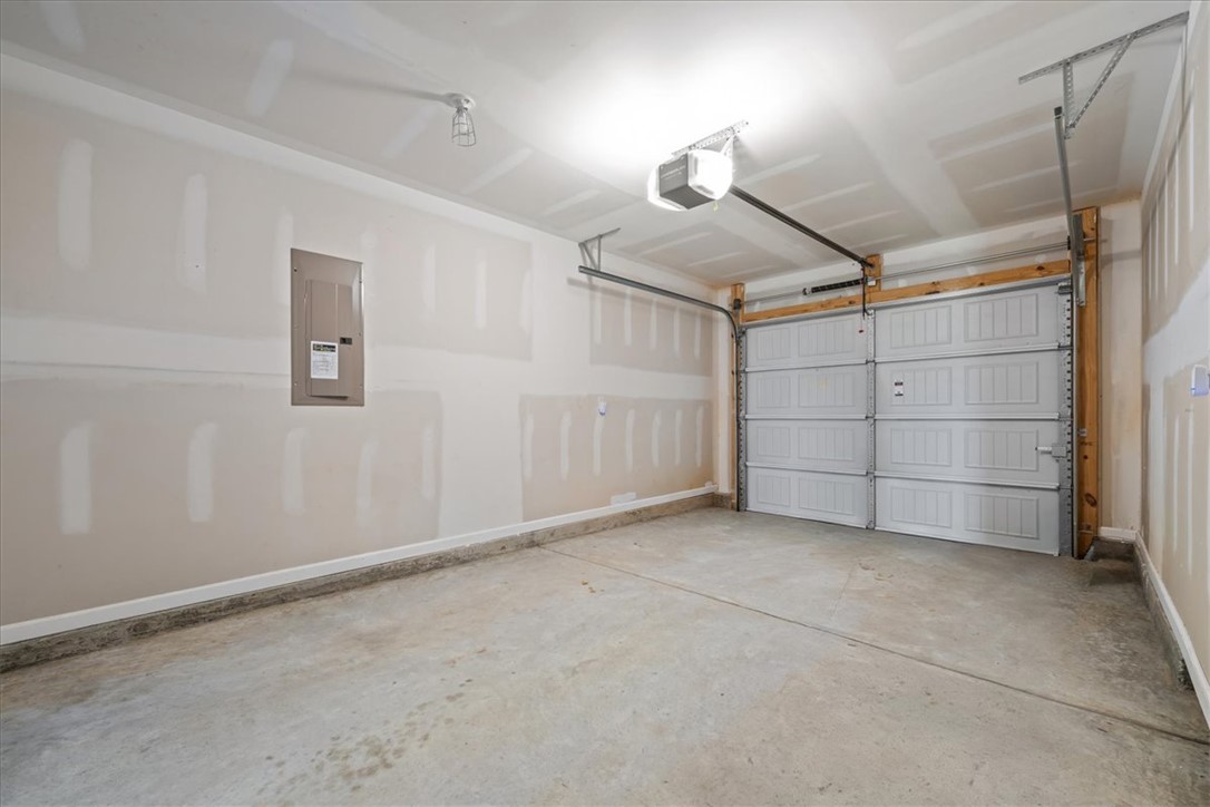 115 Adger Road Pendleton, SC 29670 - Photo 13 of 36 Secure parking and extra storage space await in this well-maintained attached garage.