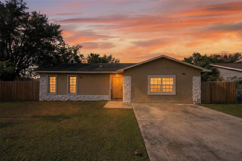 5438 Snowflake Court Orlando, FL 32839 - Photo 38 of 38 front view of a house with a yard
