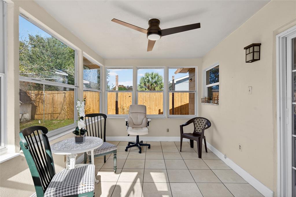 5438 Snowflake Court Orlando, FL 32839 - Photo 5 of 38 a living room with furniture and a large window