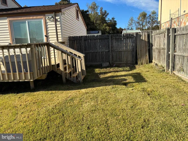 a view of stairs and wooden fence