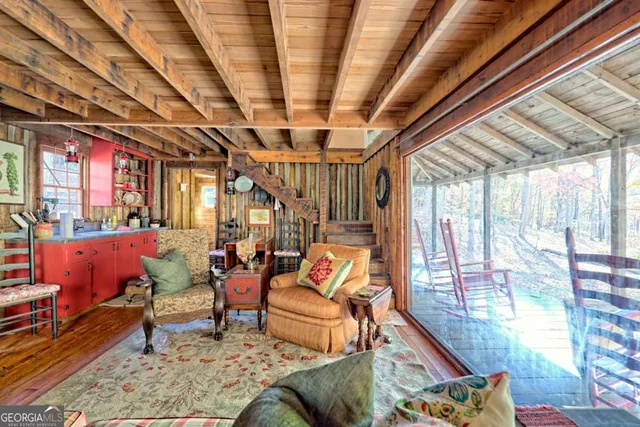 a view of a chairs and table in the patio
