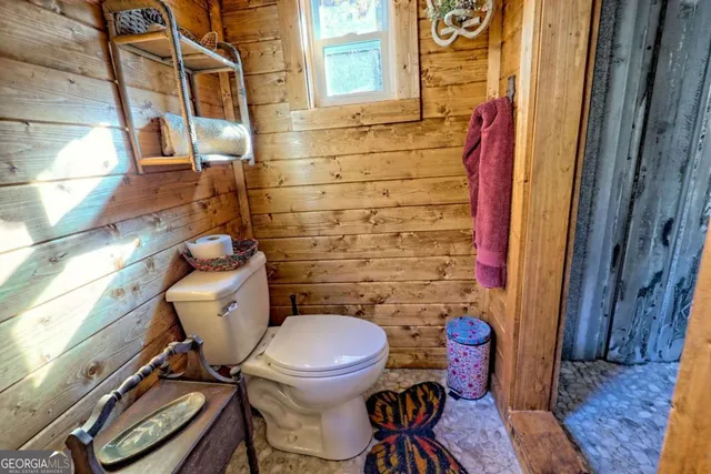 a view of porch with wooden floor
