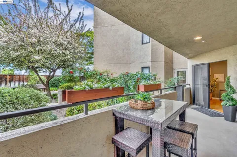 a view of a swimming pool with a yard