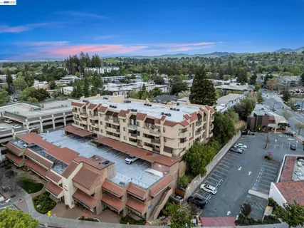an aerial view of a city with lots of residential buildings