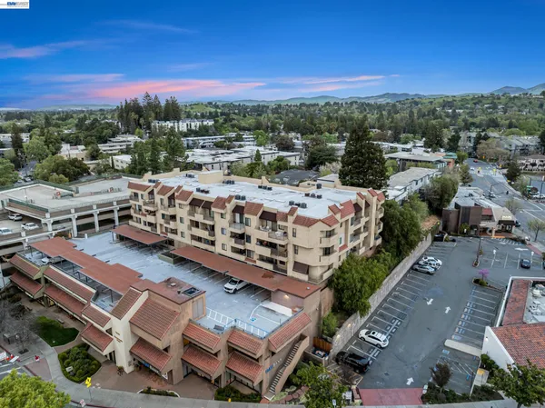 an aerial view of a city with lots of residential buildings