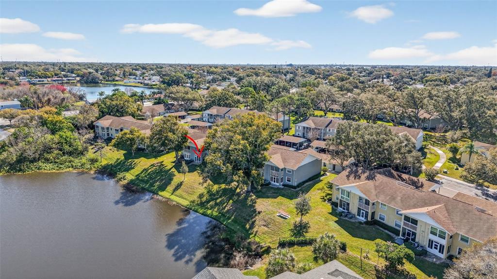 1438 Millstream Lane, Unit 105 Dunedin, FL 34698 - Photo 31 of 34 an aerial view of a city