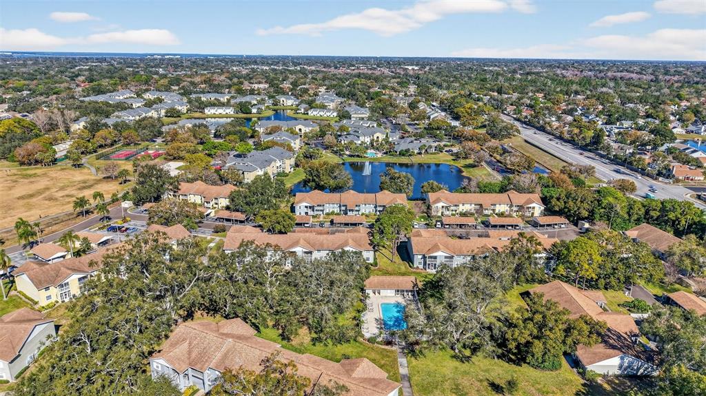 1438 Millstream Lane, Unit 105 Dunedin, FL 34698 - Photo 34 of 34 an aerial view of a city