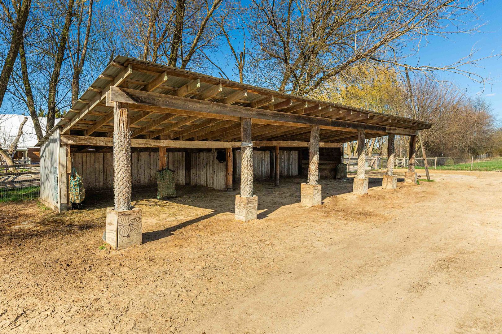 4N681 Munger Road Wayne, IL 60184 - Photo 59 of 67 a patio with a table and chairs and potted plants