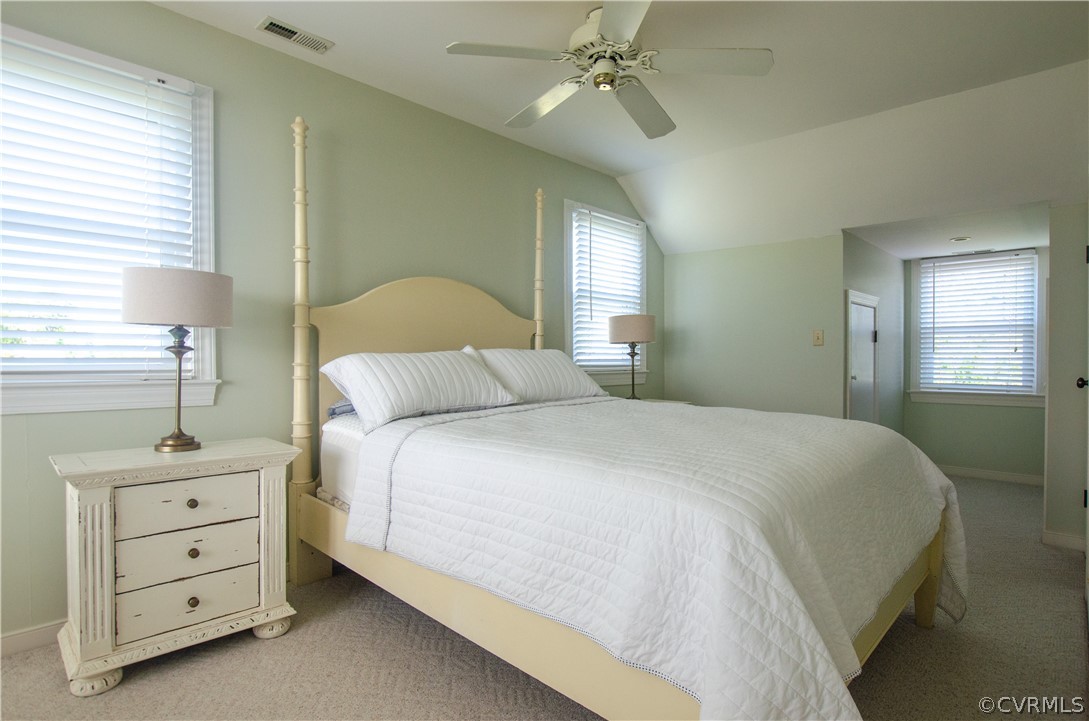 4773 Windmill Point Road White Stone, VA 22578 - Photo 27 of 36 a bedroom with a bed and a window