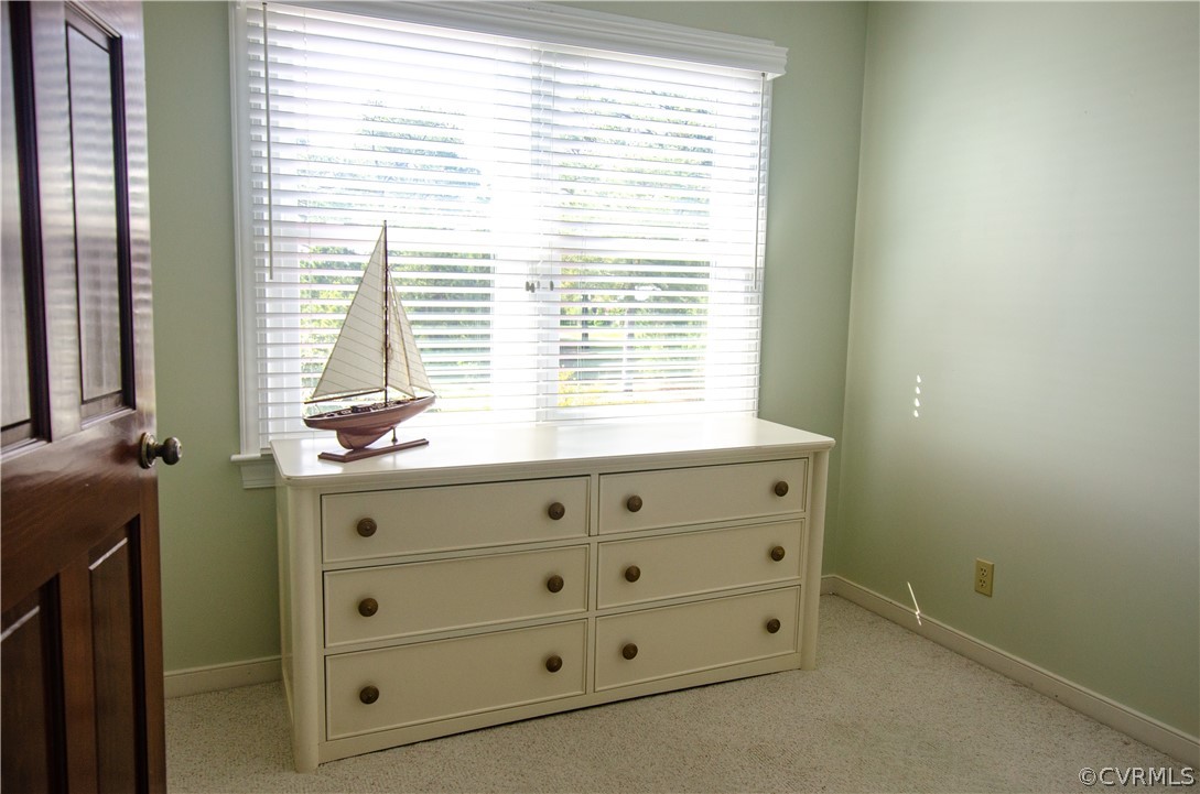 4773 Windmill Point Road White Stone, VA 22578 - Photo 29 of 36 a room with window closet and dresser