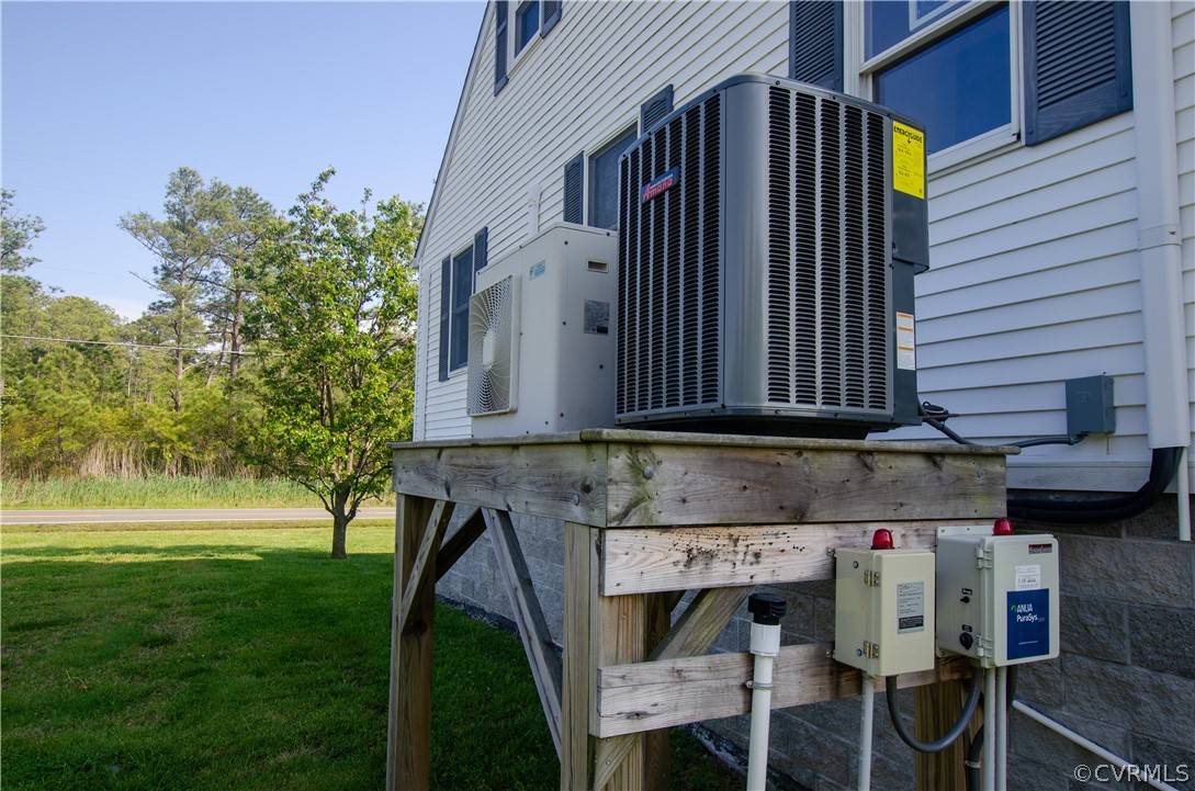 4773 Windmill Point Road White Stone, VA 22578 - Photo 33 of 36 a view of backyard with cabin