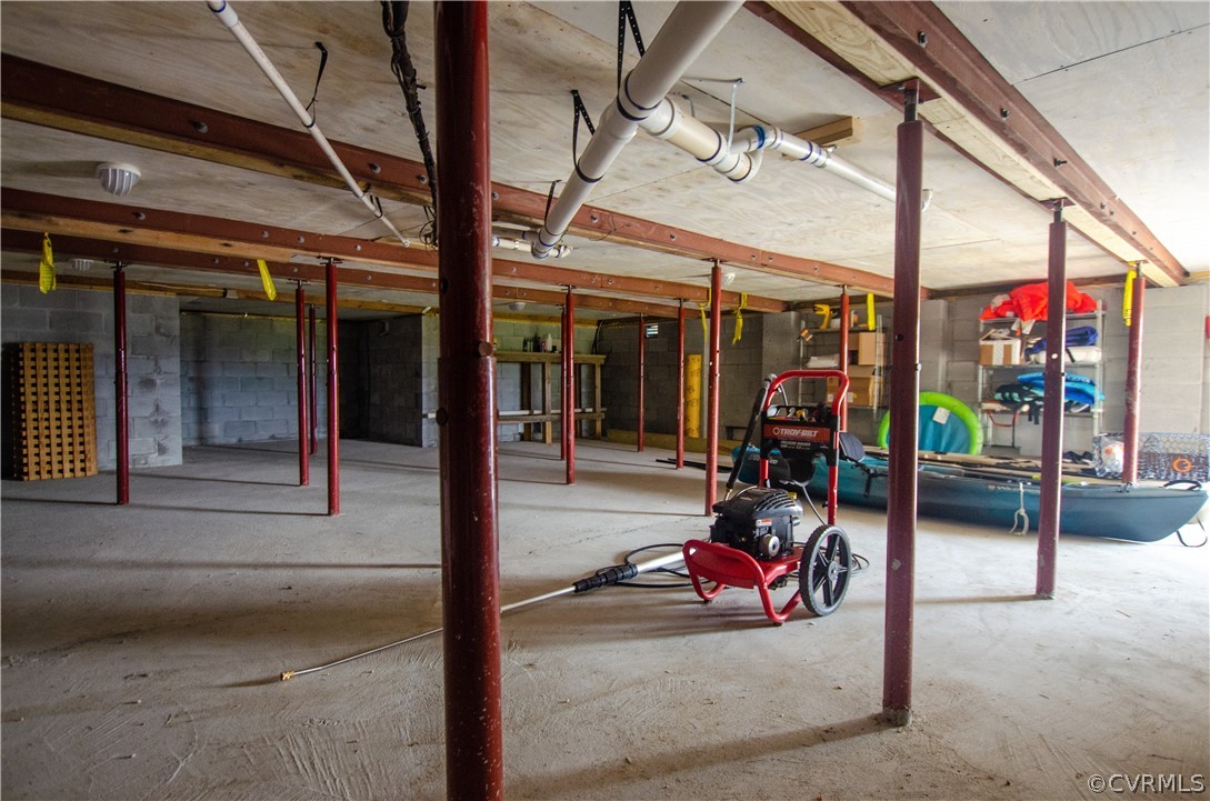 4773 Windmill Point Road White Stone, VA 22578 - Photo 35 of 36 a view of a storage room with a lot of stuff