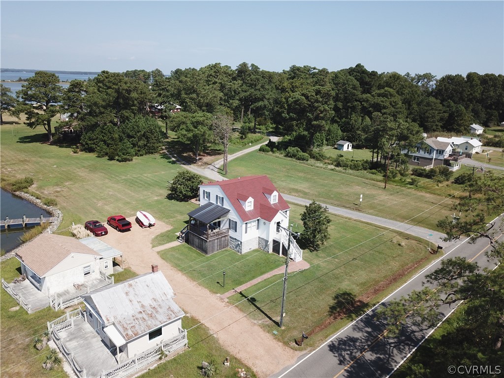 4773 Windmill Point Road White Stone, VA 22578 - Photo 5 of 36 an aerial view of a house with outdoor space
