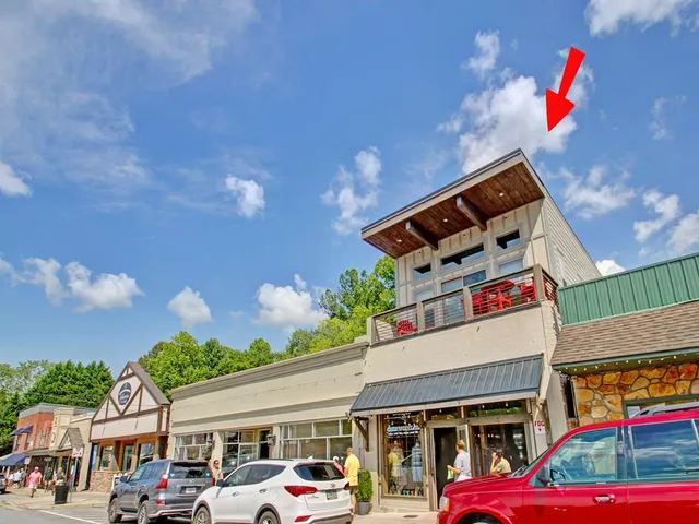 a view of a hallway with a furniture