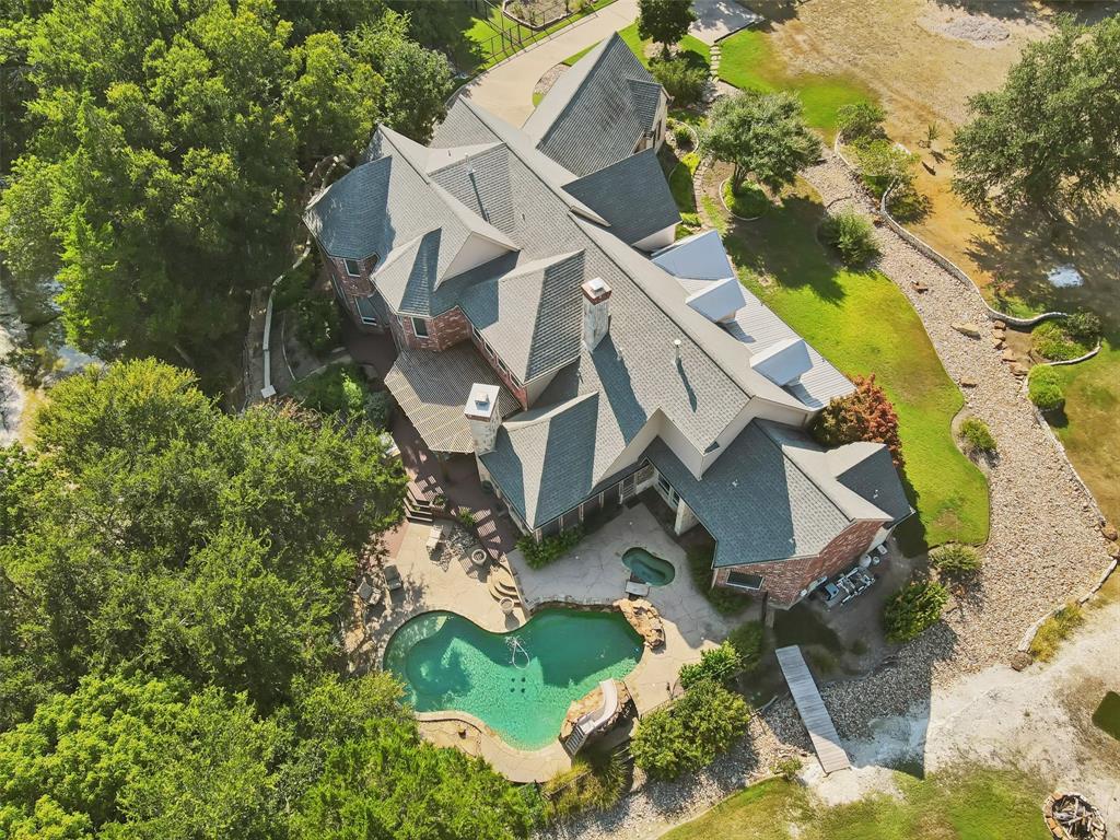 1815 West Forest Grove Road Lucas, TX 75002 - Photo 2 of 39 an aerial view of a house with a yard